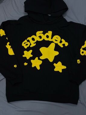 Black Hoodie with Yellow Star Graphic